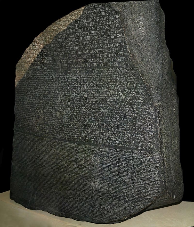 A large stone tablet with writing on it.