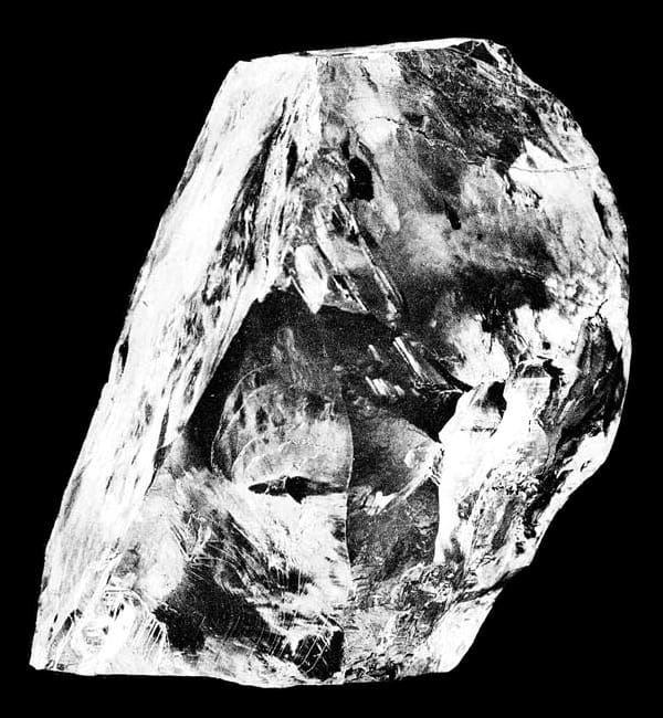A black and white photo of a diamond.