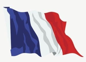 A flag of france waving in the wind.